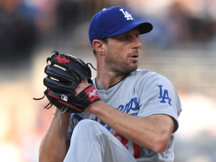 Los Angeles Dodgers starting pitcher Max Scherzer (31) throws a pitch against the San Diego Padres during the first inning at Petco Park.